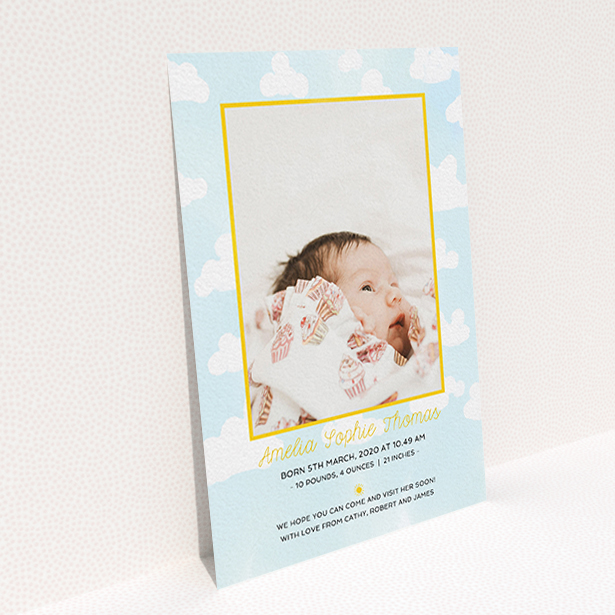 A birth announcement card design titled "Blue Skies". It is an A6 card in a portrait orientation. It is a photographic birth announcement card with room for 1 photo. "Blue Skies" is available as a flat card, with tones of blue, yellow and white.