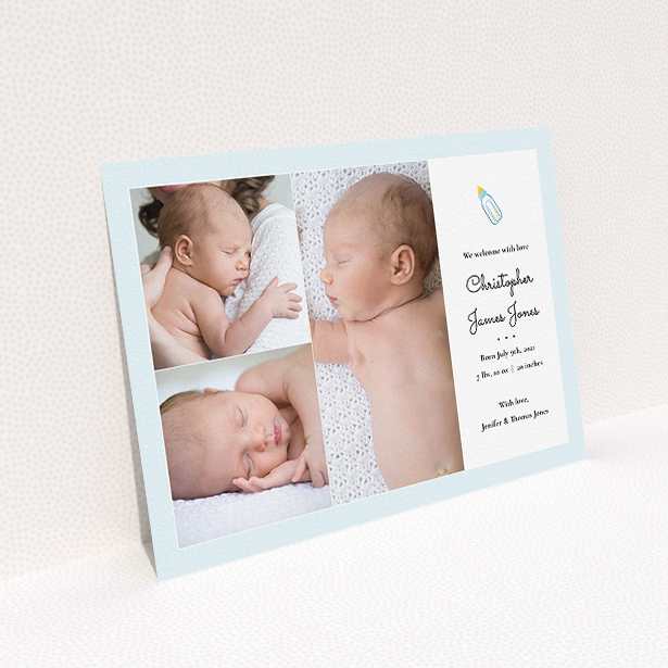 A birth announcement card called "Bottled Up". It is an A5 card in a landscape orientation. It is a photographic birth announcement card with room for 3 photos. "Bottled Up" is available as a flat card, with tones of blue and white.