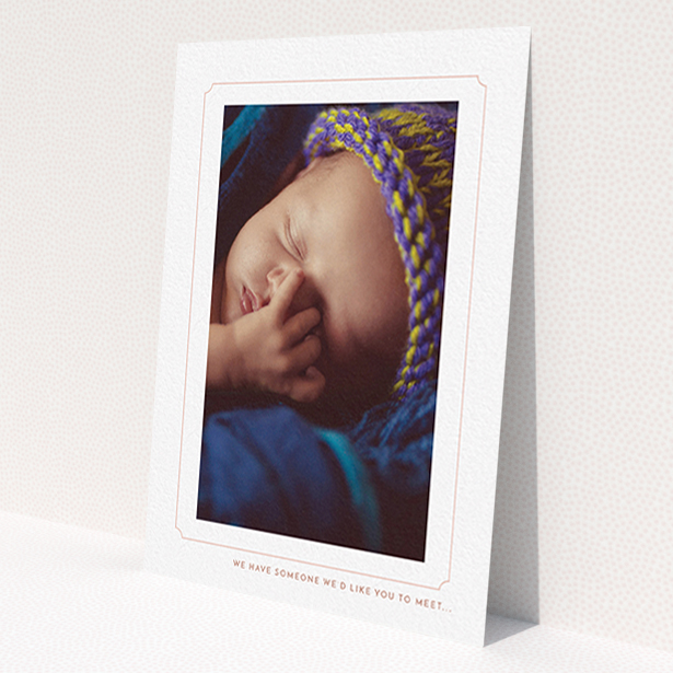 A birth announcement card design named 'Pink notch Frame'. It is an A6 card in a portrait orientation. It is a photographic birth announcement card with room for 1 photo. 'Pink notch Frame' is available as a flat card, with tones of white and pink.