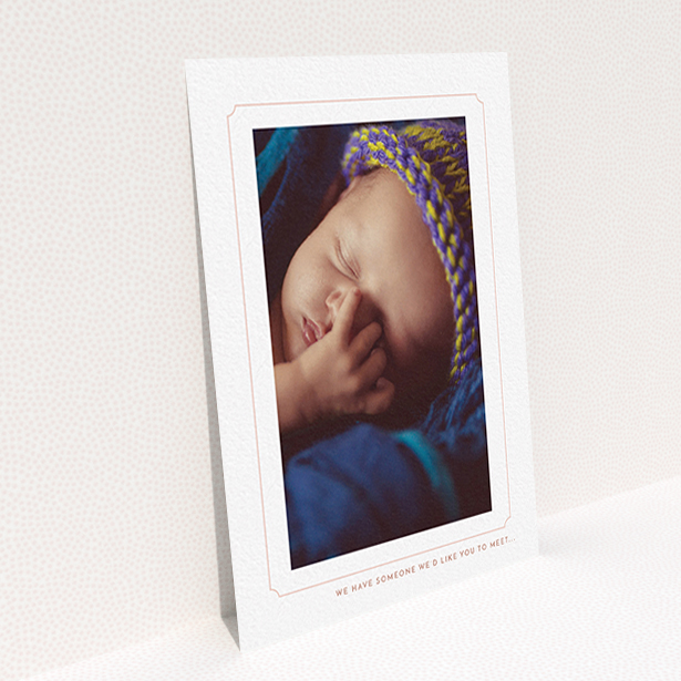 A birth announcement card design named "Pink notch Frame". It is an A6 card in a portrait orientation. It is a photographic birth announcement card with room for 1 photo. "Pink notch Frame" is available as a flat card, with tones of white and pink.