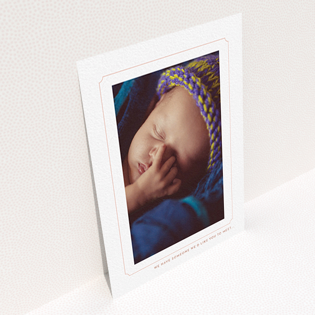 A birth announcement card design named "Pink notch Frame". It is an A6 card in a portrait orientation. It is a photographic birth announcement card with room for 1 photo. "Pink notch Frame" is available as a flat card, with tones of white and pink.