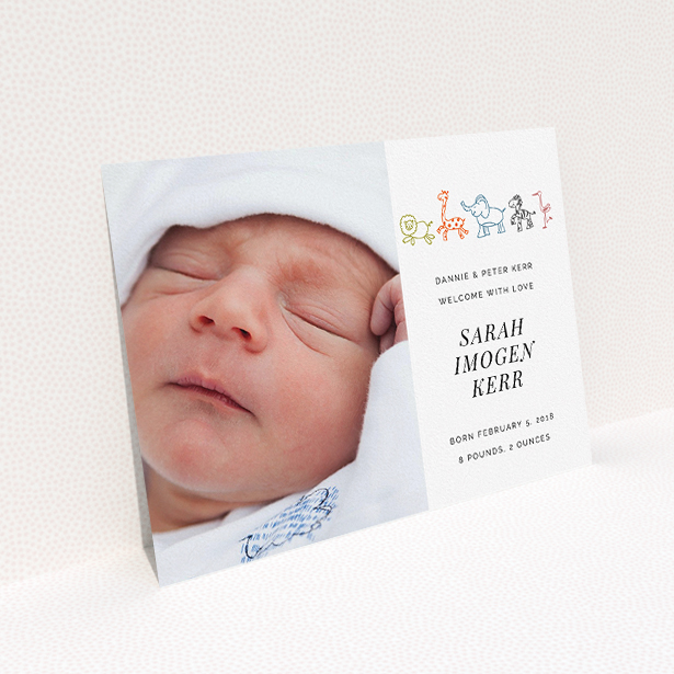 A birth announcement card design called "Playground Safari". It is an A5 card in a landscape orientation. It is a photographic birth announcement card with room for 1 photo. "Playground Safari" is available as a flat card, with tones of white and orange.