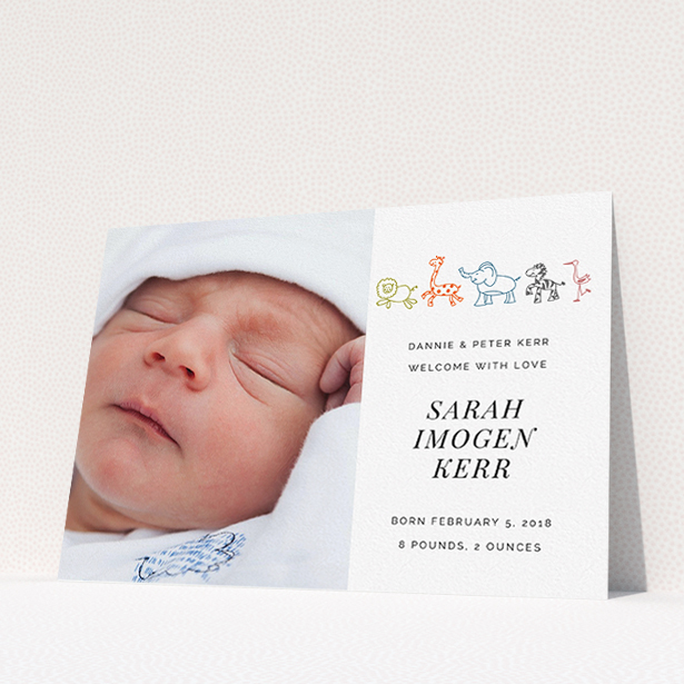 A birth announcement card design called "Playground Safari". It is an A5 card in a landscape orientation. It is a photographic birth announcement card with room for 1 photo. "Playground Safari" is available as a flat card, with tones of white and orange.