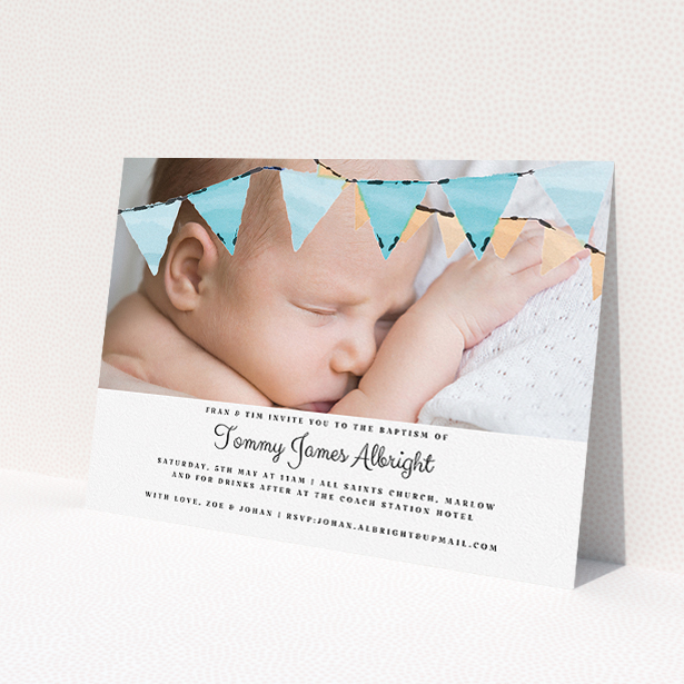 A christening invitation named 'Blue Bunting'. It is an A5 invite in a landscape orientation. It is a photographic christening invitation with room for 1 photo. 'Blue Bunting' is available as a flat invite, with tones of blue and white.