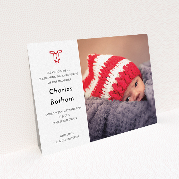 A christening invitation template titled "Onesie". It is an A5 invite in a landscape orientation. It is a photographic christening invitation with room for 1 photo. "Onesie" is available as a flat invite, with tones of white and red.