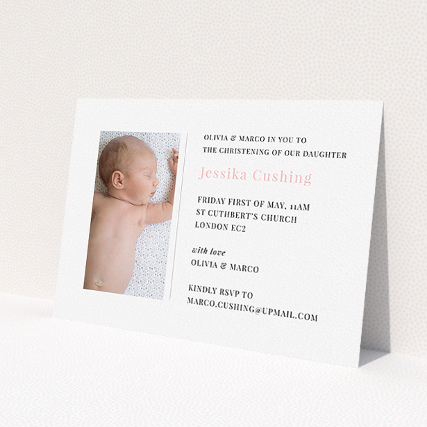 A christening invitation template titled 'Please Welcome'. It is an A5 invite in a landscape orientation. It is a photographic christening invitation with room for 1 photo. 'Please Welcome' is available as a flat invite, with tones of white and pink.