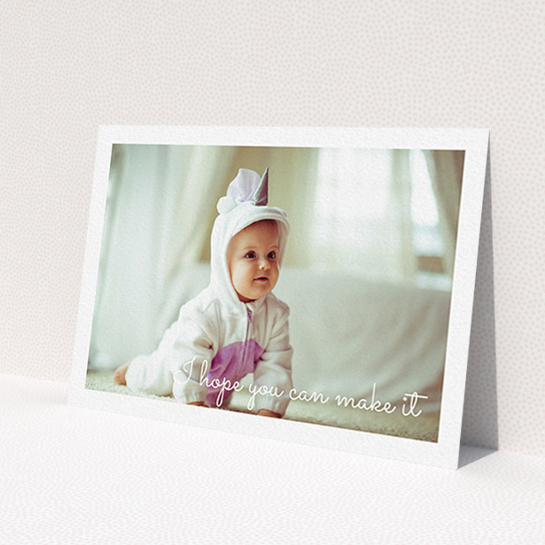 A christening invitation design called 'See you at the font'. It is an A6 invite in a landscape orientation. It is a photographic christening invitation with room for 1 photo. 'See you at the font' is available as a flat invite, with mainly white colouring.