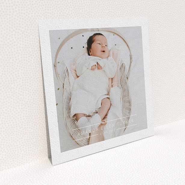 A christening invitation design titled "Tramlines". It is a square (148mm x 148mm) invite in a square orientation. It is a photographic christening invitation with room for 1 photo. "Tramlines" is available as a flat invite, with mainly white colouring.