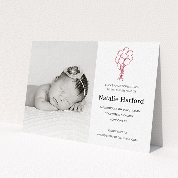 A christening invite design called 'Celebration'. It is an A5 invite in a landscape orientation. It is a photographic christening invite with room for 1 photo. 'Celebration' is available as a flat invite, with tones of white and red.