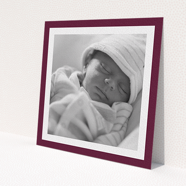 A christening invite template titled 'Classic Burgundy Photo Frame'. It is a square (148mm x 148mm) invite in a square orientation. It is a photographic christening invite with room for 1 photo. 'Classic Burgundy Photo Frame' is available as a flat invite, with tones of burgundy and white.