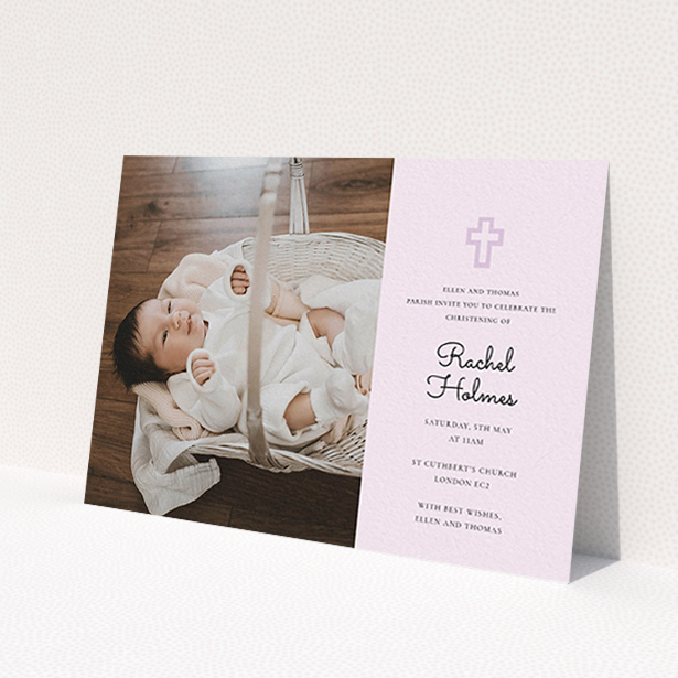 A christening invite design called 'Cross Photo'. It is an A6 invite in a landscape orientation. It is a photographic christening invite with room for 1 photo. 'Cross Photo' is available as a flat invite, with mainly purple/dark pink colouring.