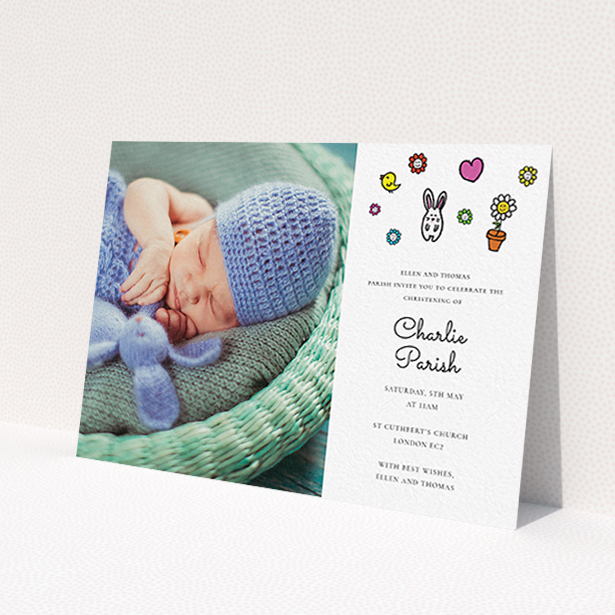 A christening invite design called 'Nursery Abstract'. It is an A6 invite in a landscape orientation. It is a photographic christening invite with room for 1 photo. 'Nursery Abstract' is available as a flat invite, with mainly white colouring.