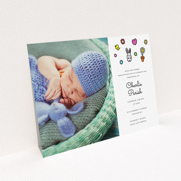 A christening invite design called "Nursery Abstract". It is an A6 invite in a landscape orientation. It is a photographic christening invite with room for 1 photo. "Nursery Abstract" is available as a flat invite, with mainly white colouring.