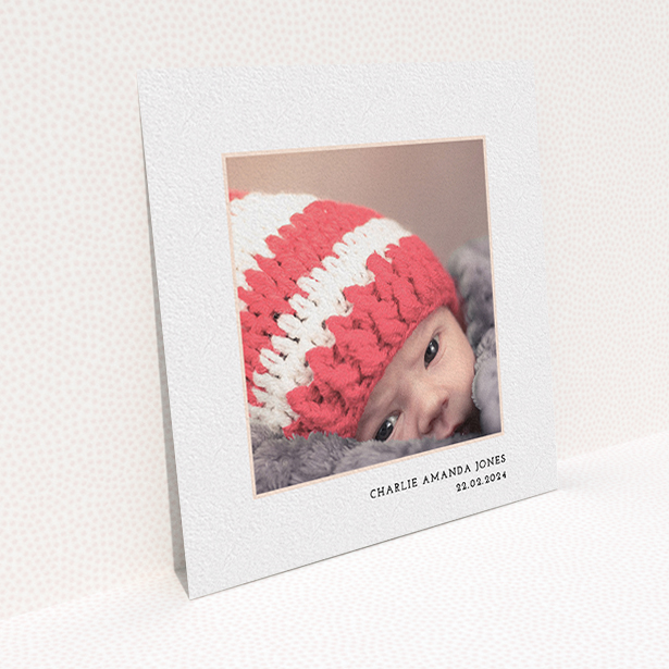 A christening invite design titled "Photo Centre". It is a square (148mm x 148mm) invite in a square orientation. It is a photographic christening invite with room for 1 photo. "Photo Centre" is available as a flat invite, with mainly white colouring.