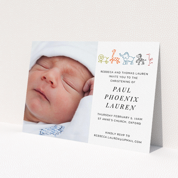 A christening invite design titled 'Playground Safari'. It is an A5 invite in a landscape orientation. It is a photographic christening invite with room for 1 photo. 'Playground Safari' is available as a flat invite, with tones of white and orange.