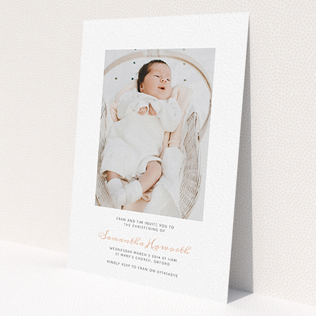 A christening invite called 'Right in the middle'. It is an A6 invite in a portrait orientation. It is a photographic christening invite with room for 1 photo. 'Right in the middle' is available as a flat invite, with tones of white and pink.