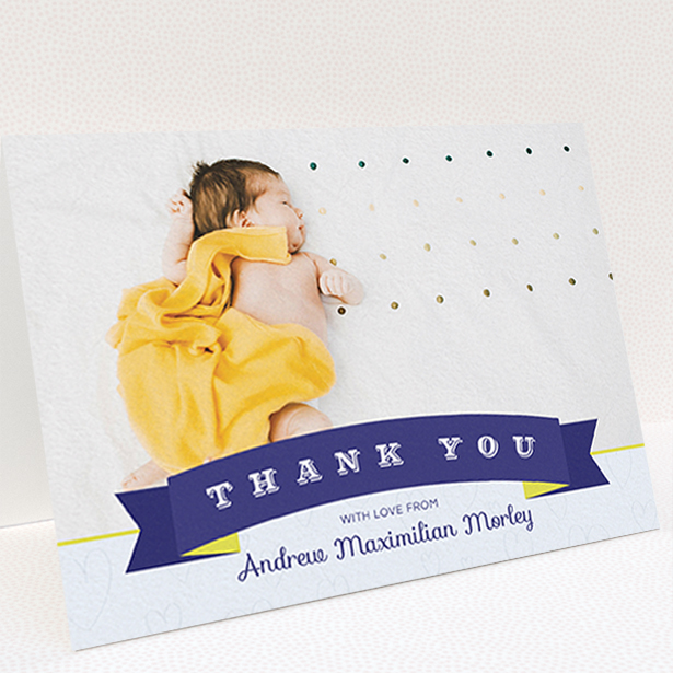 A christening thank you card called "Big Banner". It is an A6 card in a landscape orientation. It is a photographic christening thank you card with room for 1 photo. "Big Banner" is available as a folded card, with tones of blue, yellow and light blue.