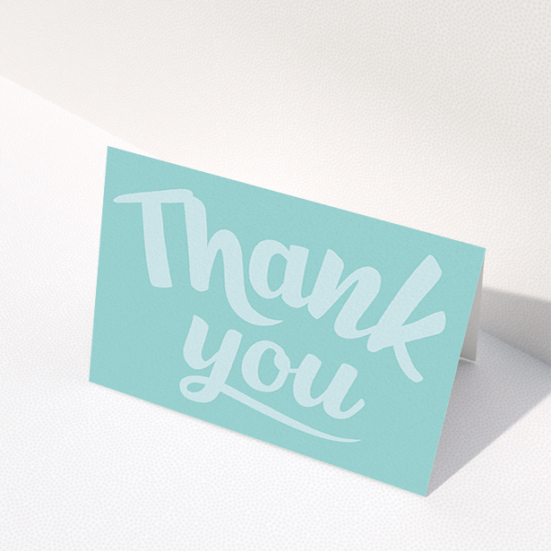 A christening thank you card called "Big Blue Typography". It is an A6 card in a landscape orientation. "Big Blue Typography" is available as a folded card, with mainly blue colouring.