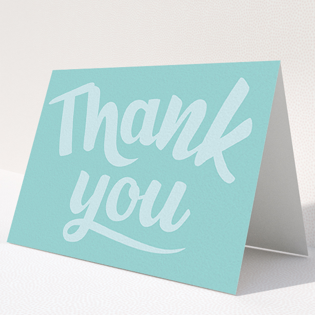 A christening thank you card called "Big Blue Typography". It is an A6 card in a landscape orientation. "Big Blue Typography" is available as a folded card, with mainly blue colouring.