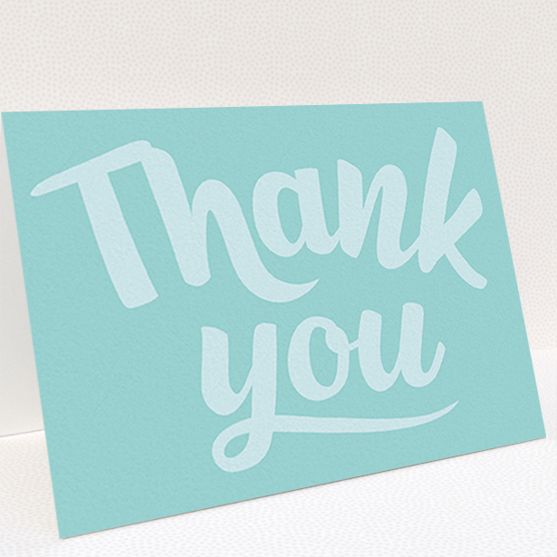 A christening thank you card called "Big Blue Typography". It is an A6 card in a landscape orientation. "Big Blue Typography" is available as a folded card, with mainly blue colouring.