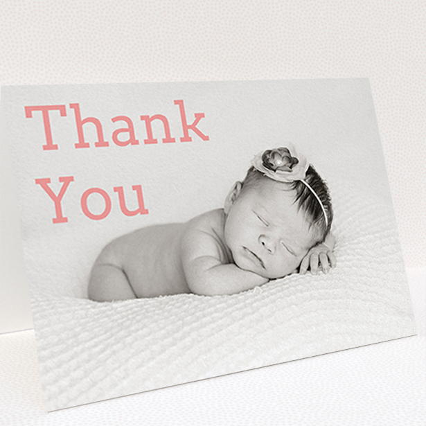 A christening thank you card design titled "Big Thanks". It is an A6 card in a landscape orientation. It is a photographic christening thank you card with room for 1 photo. "Big Thanks" is available as a folded card, with mainly light pink colouring.