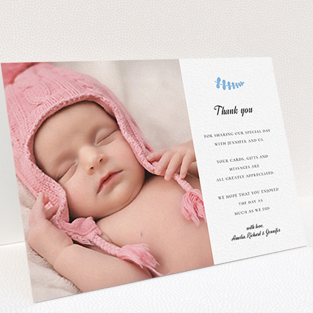 A christening thank you card design named "Blue Fern". It is an A6 card in a landscape orientation. It is a photographic christening thank you card with room for 1 photo. "Blue Fern" is available as a folded card, with tones of white and blue.
