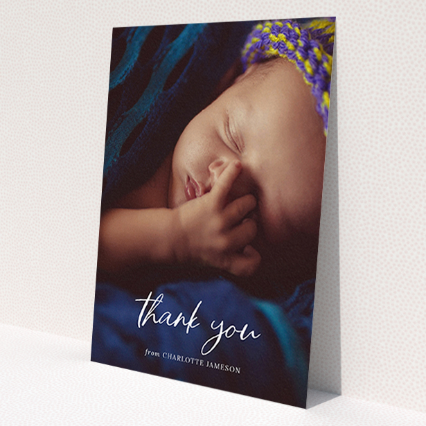 A christening thank you card template titled 'Calligraphy Thanks'. It is an A6 card in a portrait orientation. It is a photographic christening thank you card with room for 1 photo. 'Calligraphy Thanks' is available as a flat card, with mainly white colouring.
