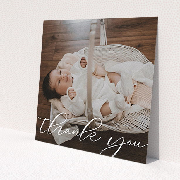 A christening thank you card template titled 'One Photo'. It is a square (148mm x 148mm) card in a square orientation. It is a photographic christening thank you card with room for 1 photo. 'One Photo' is available as a flat card, with mainly white colouring.