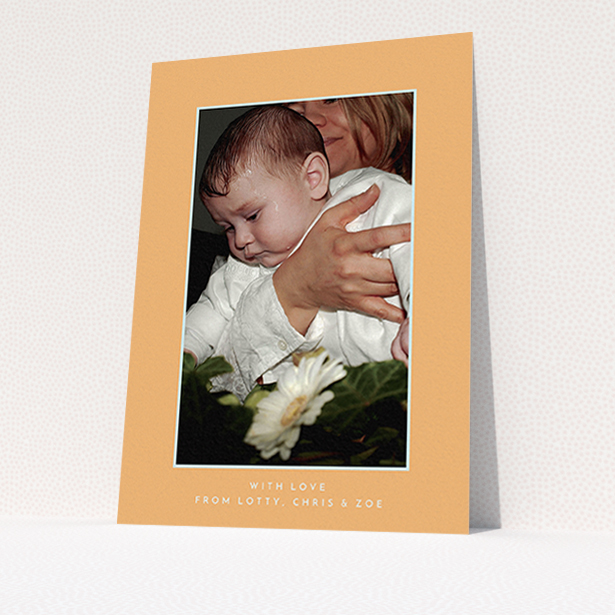 A christening thank you card design named "Orange and Mint". It is an A6 card in a portrait orientation. It is a photographic christening thank you card with room for 1 photo. "Orange and Mint" is available as a flat card, with tones of orange and blue.