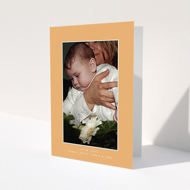 A christening thank you card design named 'Orange and Mint'. It is an A6 card in a portrait orientation. It is a photographic christening thank you card with room for 1 photo. 'Orange and Mint' is available as a folded card, with tones of orange and blue.