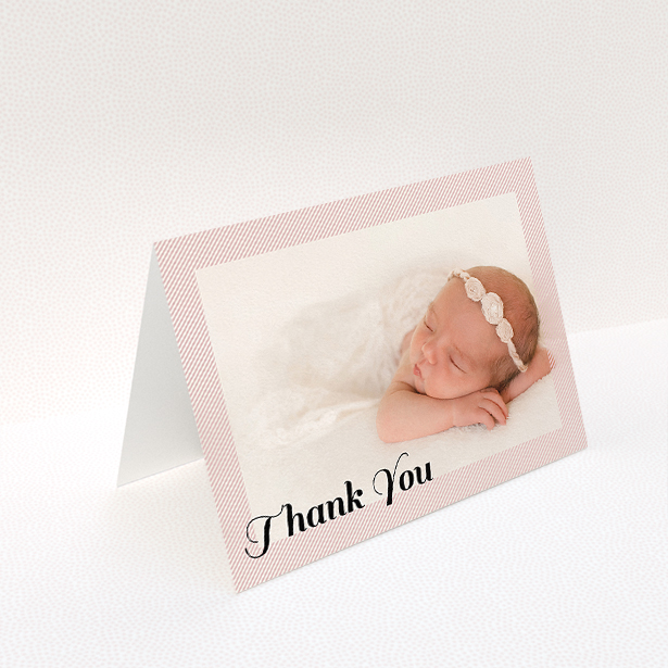 A christening thank you card named "Pastel Diagonals". It is an A5 card in a landscape orientation. It is a photographic christening thank you card with room for 1 photo. "Pastel Diagonals" is available as a folded card, with mainly pink colouring.