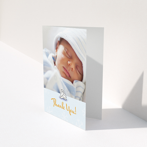 A christening thank you card template titled "Polar Picture". It is an A5 card in a portrait orientation. It is a photographic christening thank you card with room for 1 photo. "Polar Picture" is available as a folded card, with tones of blue and white.