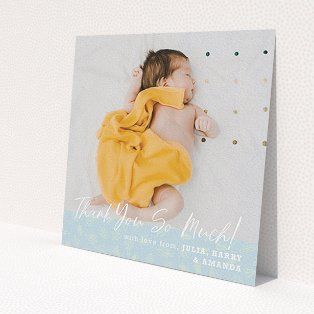 A christening thank you card design titled 'Thank You So Much'. It is a square (148mm x 148mm) card in a square orientation. It is a photographic christening thank you card with room for 1 photo. 'Thank You So Much' is available as a flat card, with tones of blue and white.