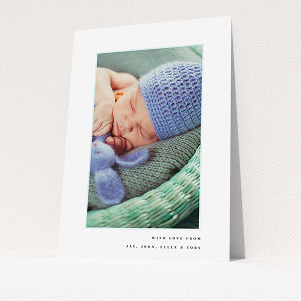 A christening thank you card template titled "Thin Blue Frame". It is an A6 card in a portrait orientation. It is a photographic christening thank you card with room for 1 photo. "Thin Blue Frame" is available as a flat card, with tones of white and blue.