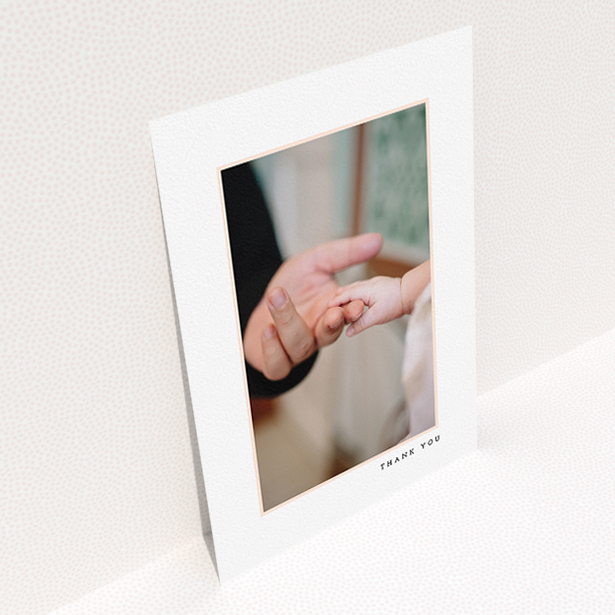 A christening thank you card called "Thin Pink Frame". It is an A5 card in a portrait orientation. It is a photographic christening thank you card with room for 1 photo. "Thin Pink Frame" is available as a flat card, with tones of white and pink.