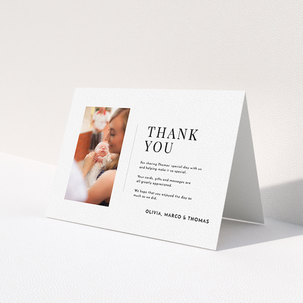 A christening thank you card template titled 'Tiny Portrait'. It is an A6 card in a landscape orientation. It is a photographic christening thank you card with room for 1 photo. 'Tiny Portrait' is available as a folded card, with mainly white colouring.