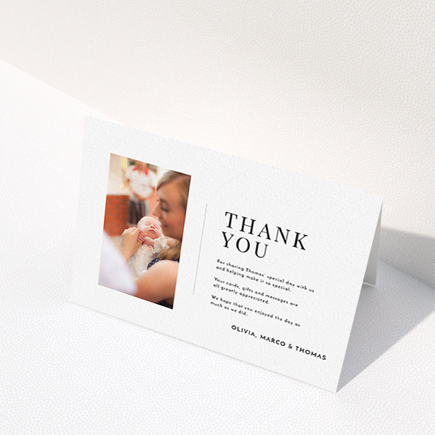 A christening thank you card template titled "Tiny Portrait". It is an A6 card in a landscape orientation. It is a photographic christening thank you card with room for 1 photo. "Tiny Portrait" is available as a folded card, with mainly white colouring.
