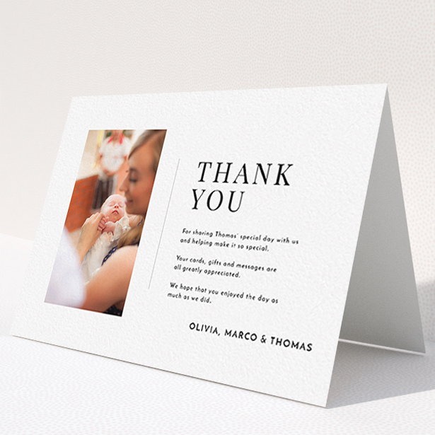 A christening thank you card template titled "Tiny Portrait". It is an A6 card in a landscape orientation. It is a photographic christening thank you card with room for 1 photo. "Tiny Portrait" is available as a folded card, with mainly white colouring.