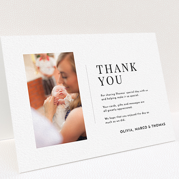 A christening thank you card template titled "Tiny Portrait". It is an A6 card in a landscape orientation. It is a photographic christening thank you card with room for 1 photo. "Tiny Portrait" is available as a folded card, with mainly white colouring.