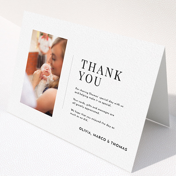 A christening thank you card template titled "Tiny Portrait". It is an A6 card in a landscape orientation. It is a photographic christening thank you card with room for 1 photo. "Tiny Portrait" is available as a folded card, with mainly white colouring.