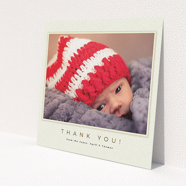 A christening thank you card design named 'Torn Cream Frame'. It is a square (148mm x 148mm) card in a square orientation. It is a photographic christening thank you card with room for 1 photo. 'Torn Cream Frame' is available as a flat card, with mainly cream colouring.