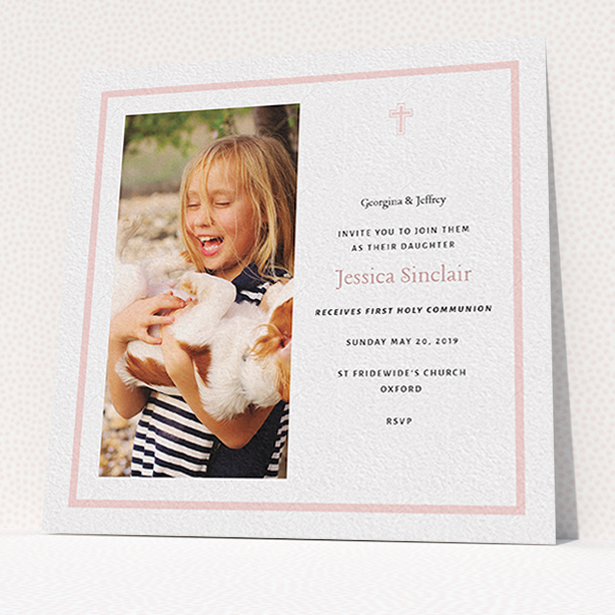 A communion invitation called "Baby Pink Cross". It is a square (148mm x 148mm) invite in a square orientation. It is a photographic communion invitation with room for 1 photo. "Baby Pink Cross" is available as a flat invite, with tones of pink and white.