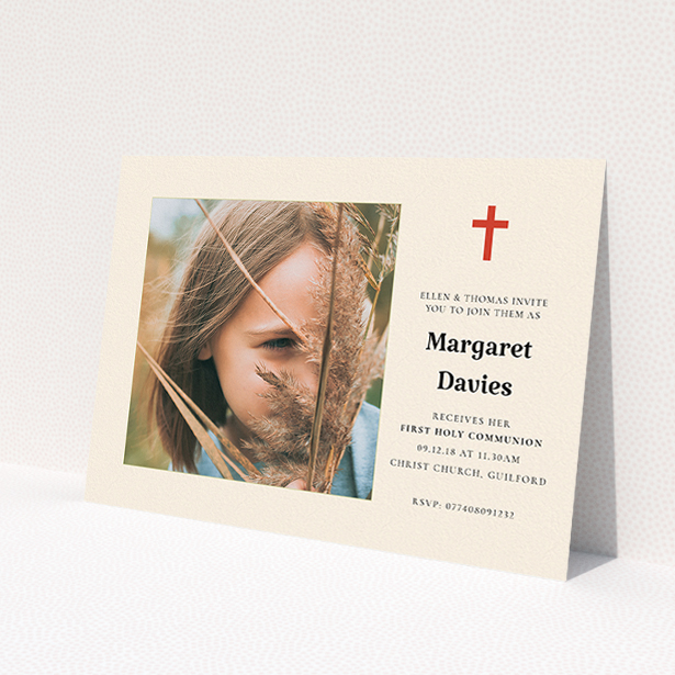 A communion invitation template titled 'Red Cross'. It is an A5 invite in a landscape orientation. It is a photographic communion invitation with room for 1 photo. 'Red Cross' is available as a flat invite, with tones of red and cream.
