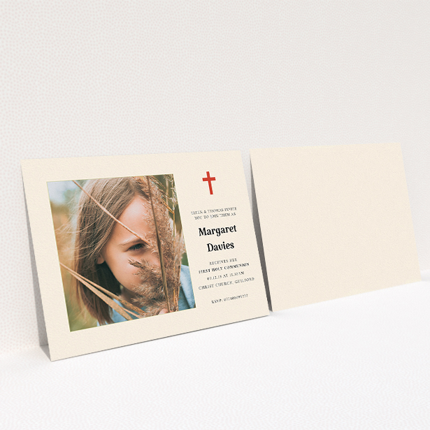 A communion invitation template titled "Red Cross". It is an A5 invite in a landscape orientation. It is a photographic communion invitation with room for 1 photo. "Red Cross" is available as a flat invite, with tones of red and cream.