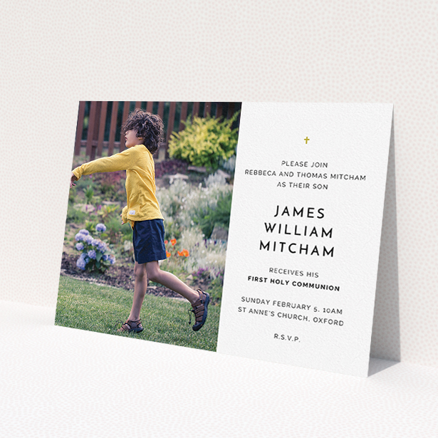 A communion invite card design named 'Tiny Cross'. It is an A5 invite in a landscape orientation. It is a photographic communion invite card with room for 1 photo. 'Tiny Cross' is available as a flat invite, with tones of white and gold.