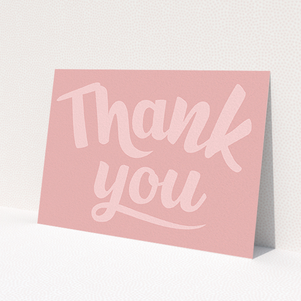 A communion thank you card design called 'Big Pink Typography'. It is an A6 card in a landscape orientation. 'Big Pink Typography' is available as a flat card, with mainly pink colouring.