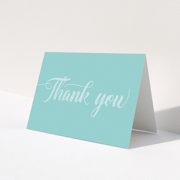 A communion thank you card design called 'Blue on Blue Typography'. It is an A6 card in a landscape orientation. 'Blue on Blue Typography' is available as a folded card, with mainly blue colouring.