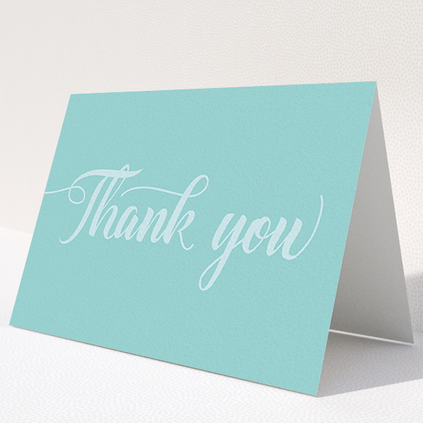 A communion thank you card design called "Blue on Blue Typography". It is an A6 card in a landscape orientation. "Blue on Blue Typography" is available as a folded card, with mainly blue colouring.