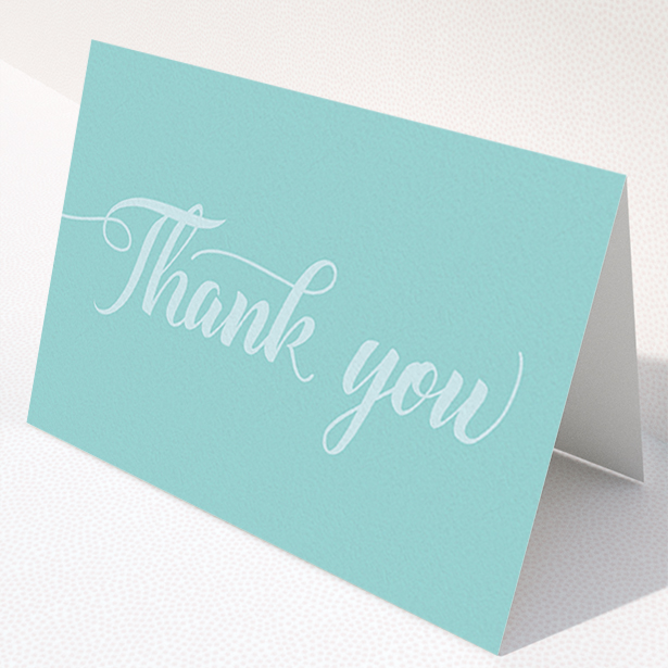 A communion thank you card design called "Blue on Blue Typography". It is an A6 card in a landscape orientation. "Blue on Blue Typography" is available as a folded card, with mainly blue colouring.