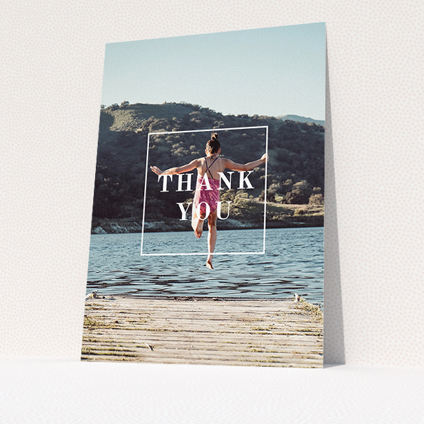 A communion thank you card template titled "Central Thanks". It is an A5 card in a portrait orientation. It is a photographic communion thank you card with room for 1 photo. "Central Thanks" is available as a flat card, with mainly white colouring.